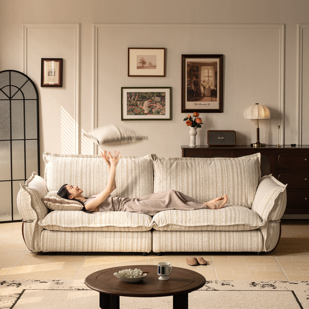 Cream boucle fabric 3 seater sofa circle in real life style.