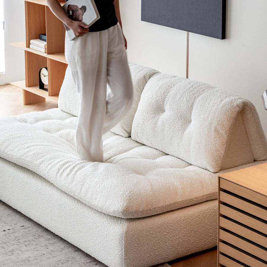 Cream boucle fabric modular 2 seater sofa couch bloc with context.