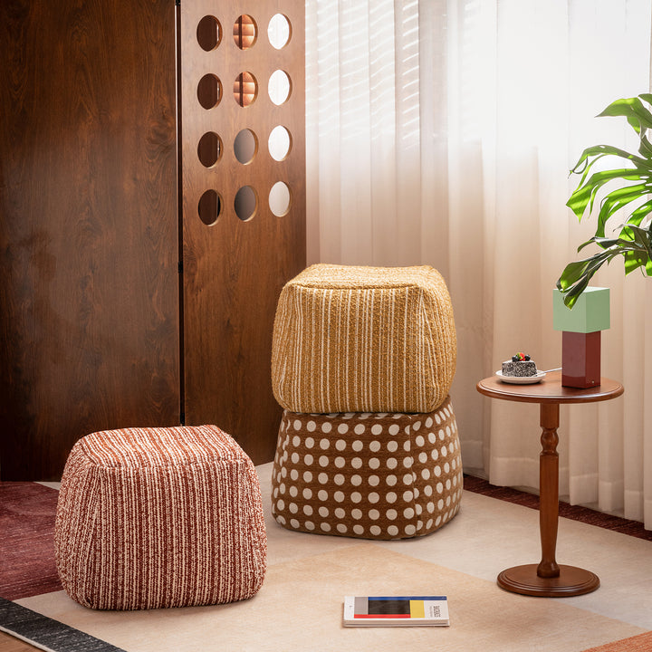 Cream boucle fabric ottoman carry in close up details.