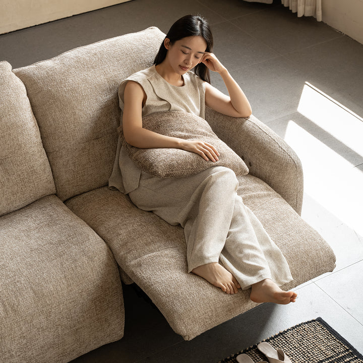 Cream chenille velvet fabric recliner 2 seater sofa mellow in still life.