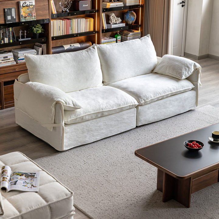 Cream cotton fabric 2 seater sofa folding ear primary product view.