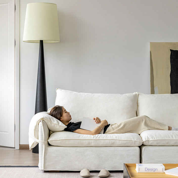 Cream cotton fabric 2 seater sofa folding ear size charts.