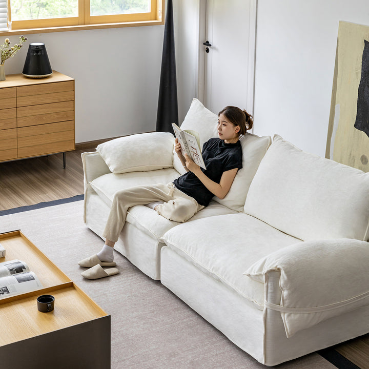 Cream cotton fabric 2 seater sofa folding ear material variants.