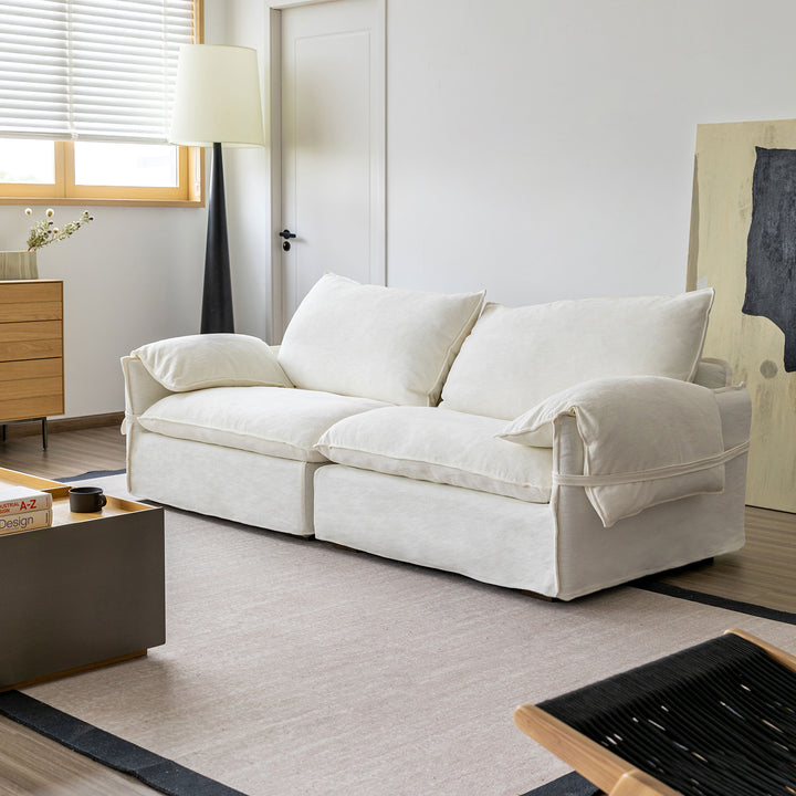 Cream cotton fabric 3 seater sofa folding ear size charts.