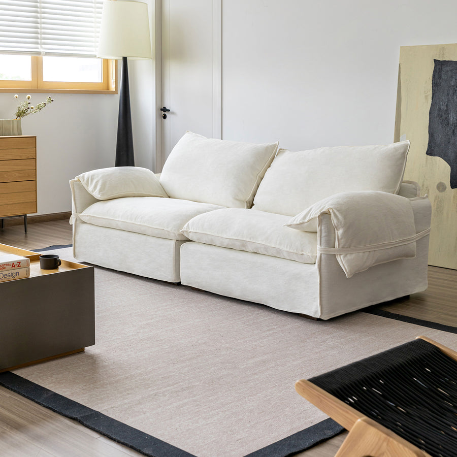 Cream cotton fabric 4 seater sofa folding ear primary product view.