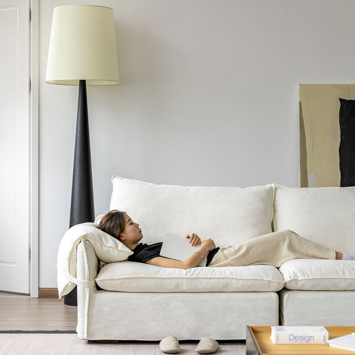 Cream cotton fabric 4 seater sofa folding ear in real life style.