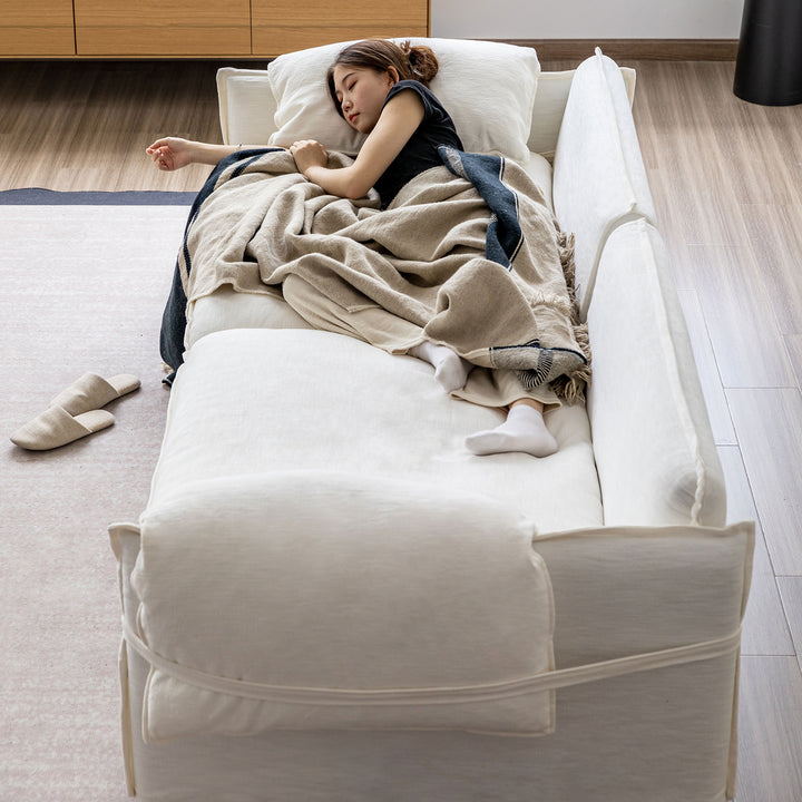 Cream cotton fabric 4 seater sofa folding ear in close up details.