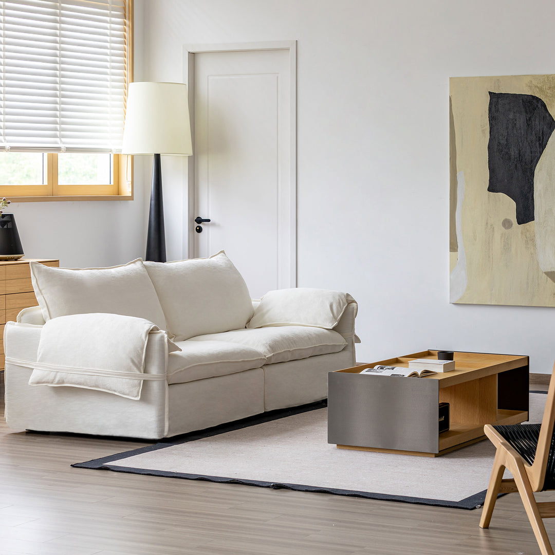 Cream cotton fabric 4 seater sofa folding ear environmental situation.