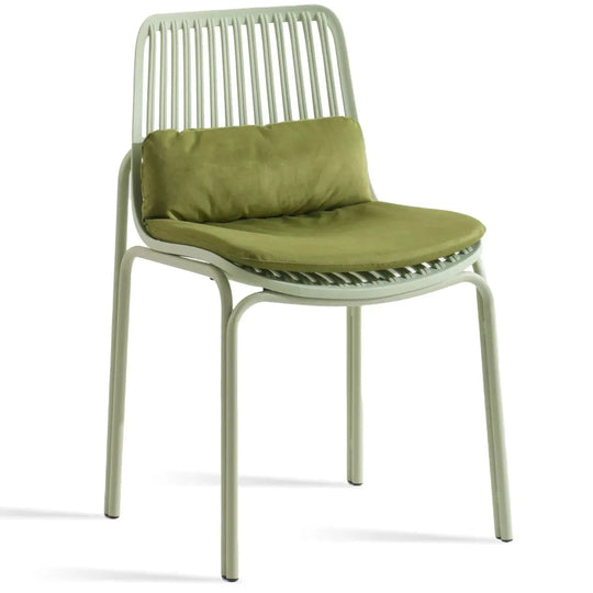 Contemporary plastic dining chair scones in white background.