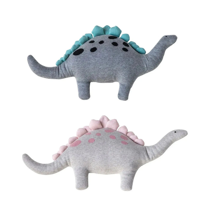 Creative storytelling cotton knit dinosaurs decor in white background.