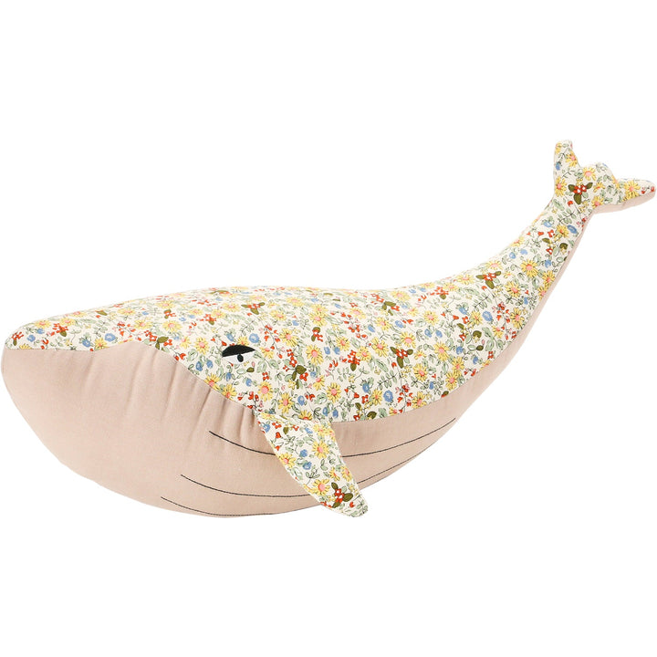 Detailed floral print plush whale bedroom decor in panoramic view.