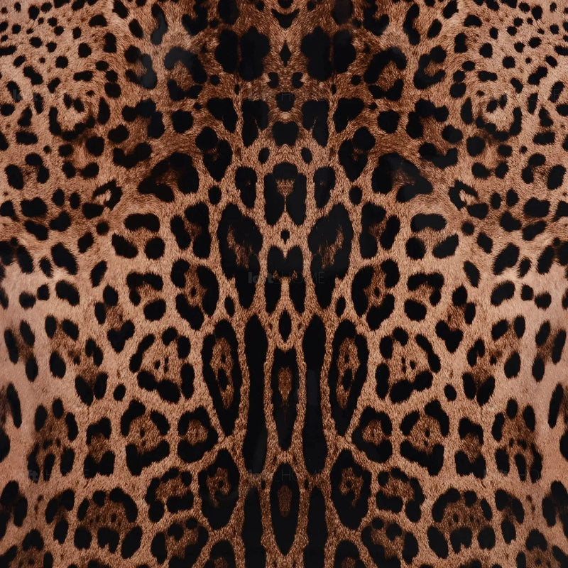 Eclectic wood coffee table leopard in still life.