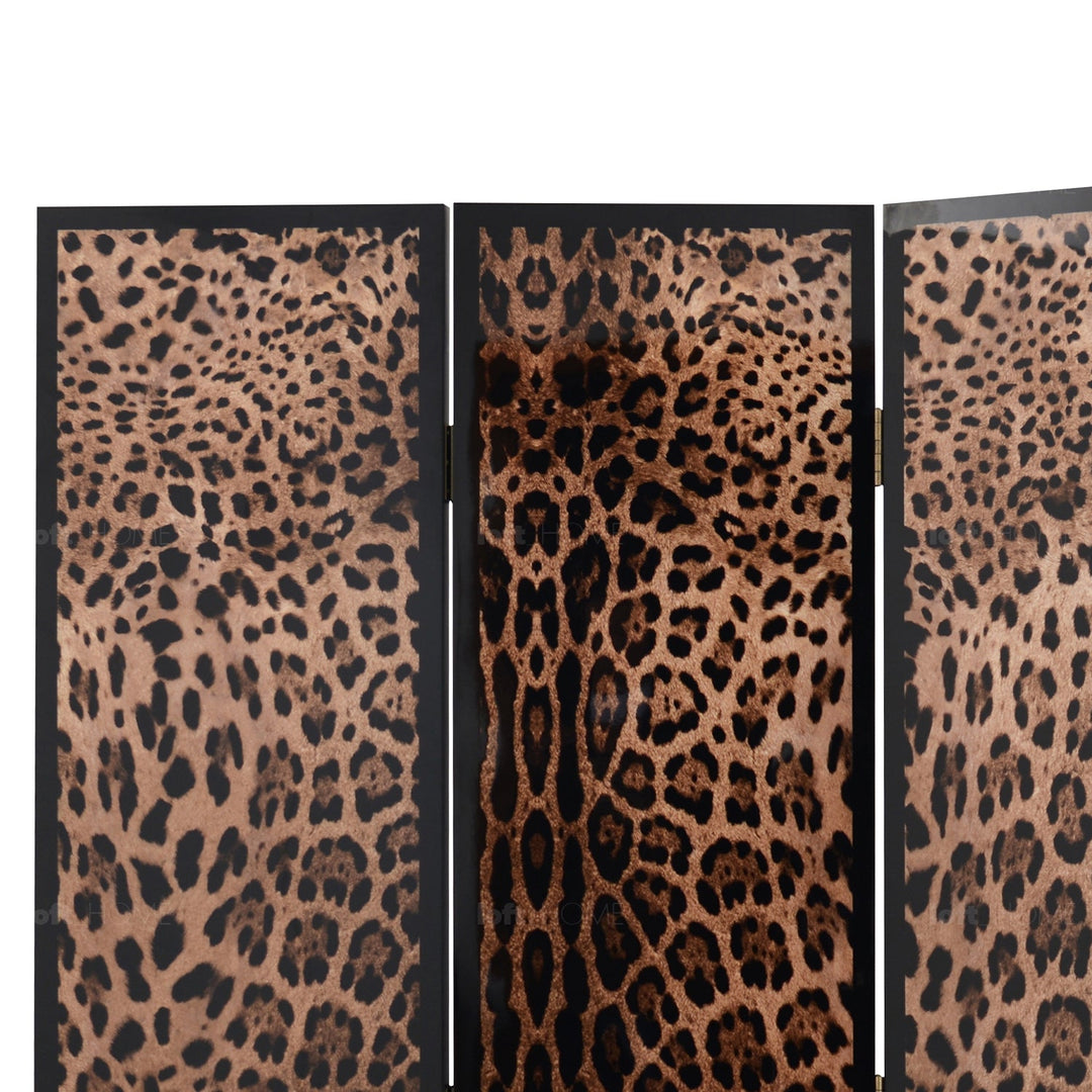 Eclectic wood divider leopard in close up details.