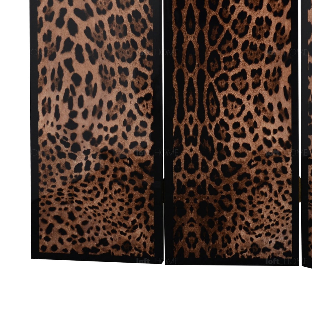Eclectic wood divider leopard with context.