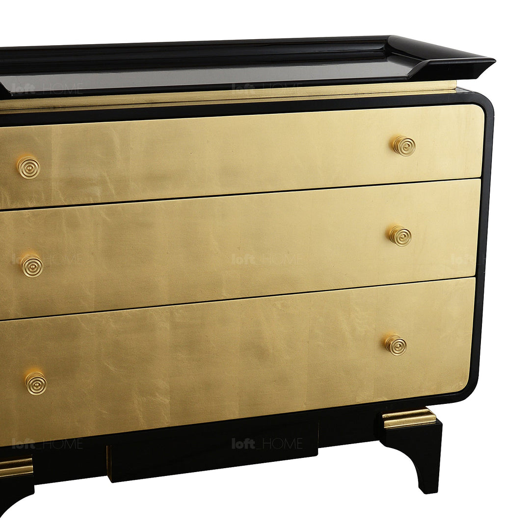 Eclectic wood drawer cabinet noirgold in panoramic view.