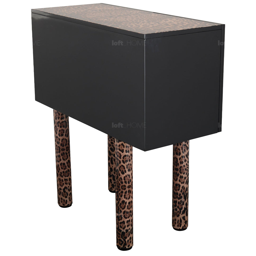 Eclectic wood storage cabinet high leopard in still life.