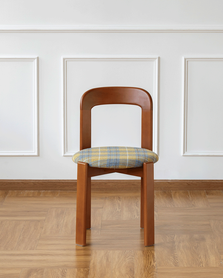 Vintage wool fabric beech wood dining chair memphis in panoramic view.