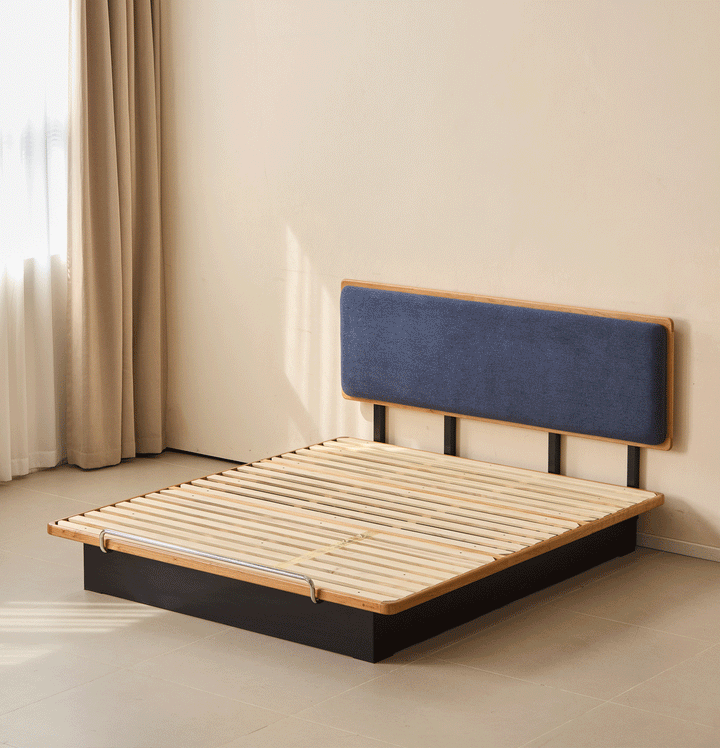Bauhaus cherry wood storage bed film in still life.