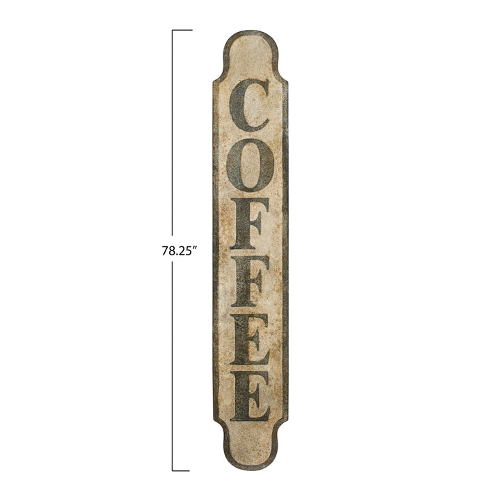Heavily distressed metal "coffee" wall decor size charts.