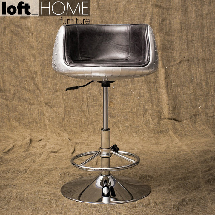 Industrial aluminium genuine leather bar chair aircraft in panoramic view.