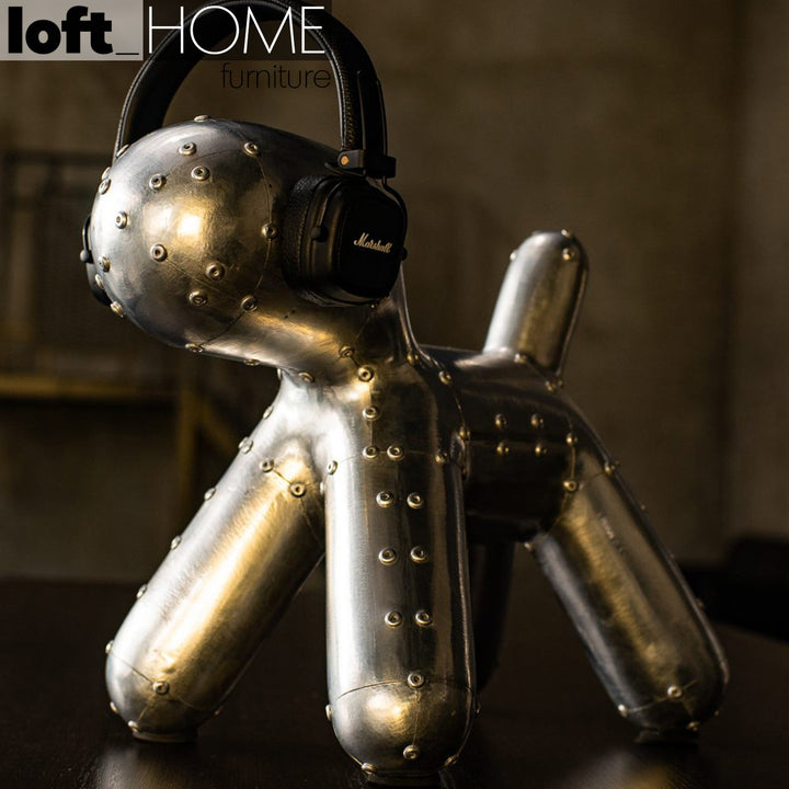 Industrial aluminium puppy dog decor in real life style.