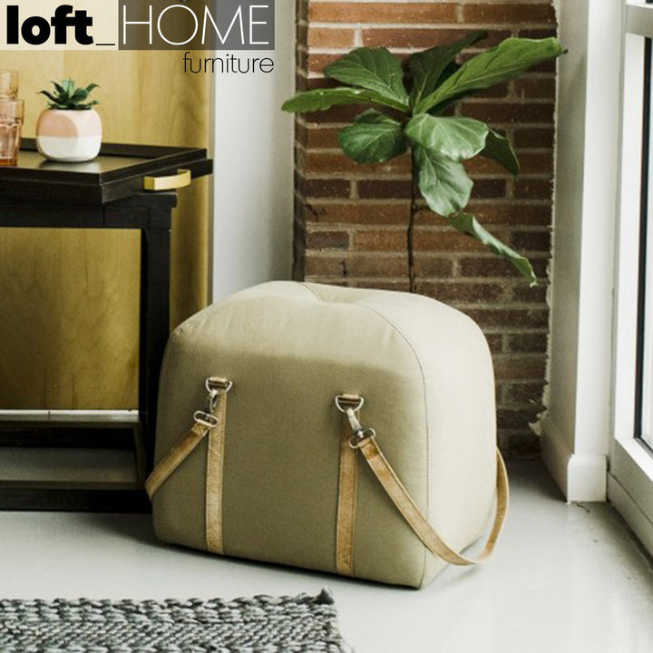 Industrial canvas ottoman stool travel primary product view.