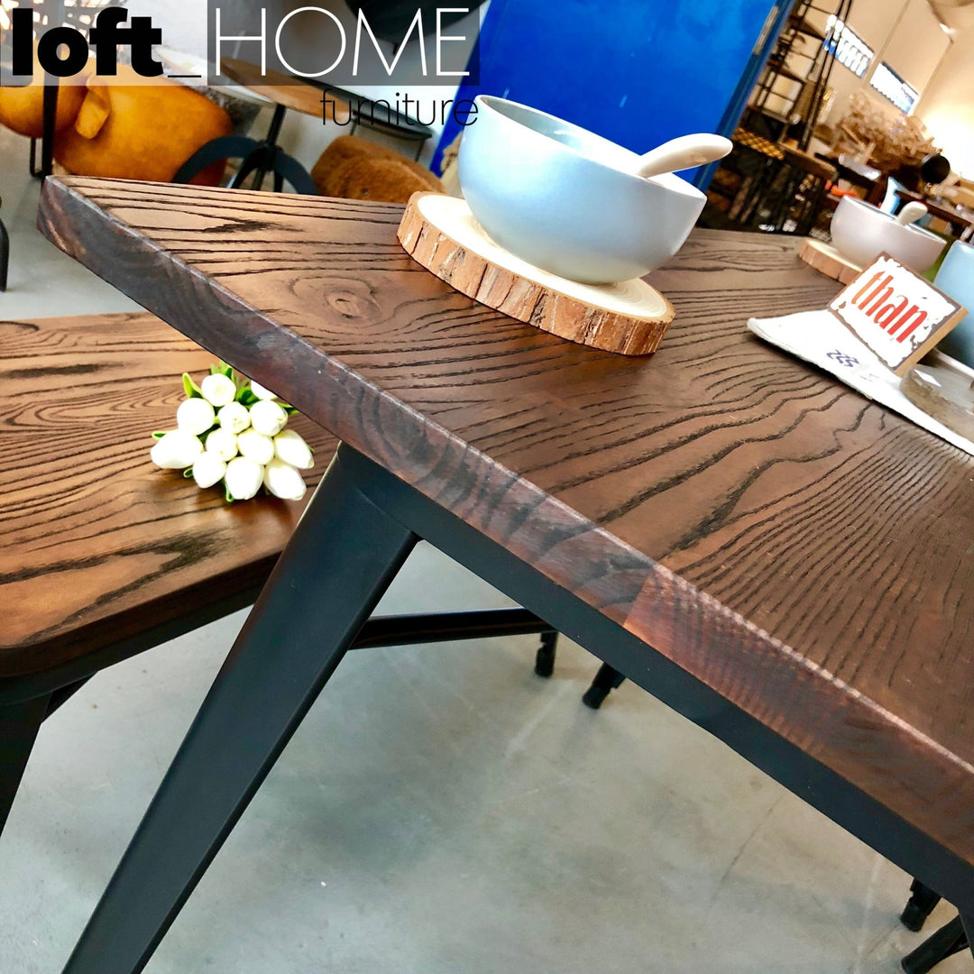Industrial elm wood dining table sanctum x in close up details.