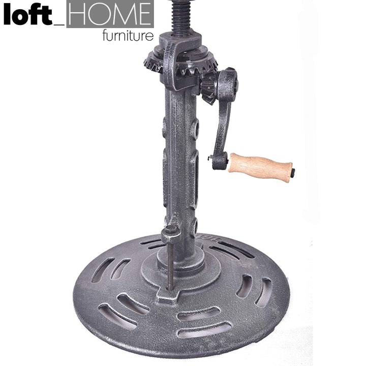 Industrial leather height adjustable stool gear in details.