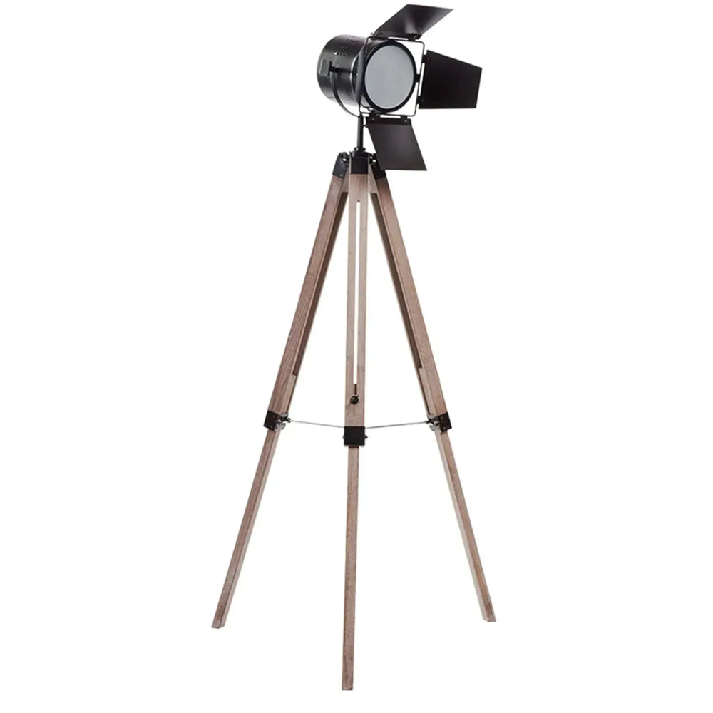 Industrial metal floor lamp tripod s in white background.