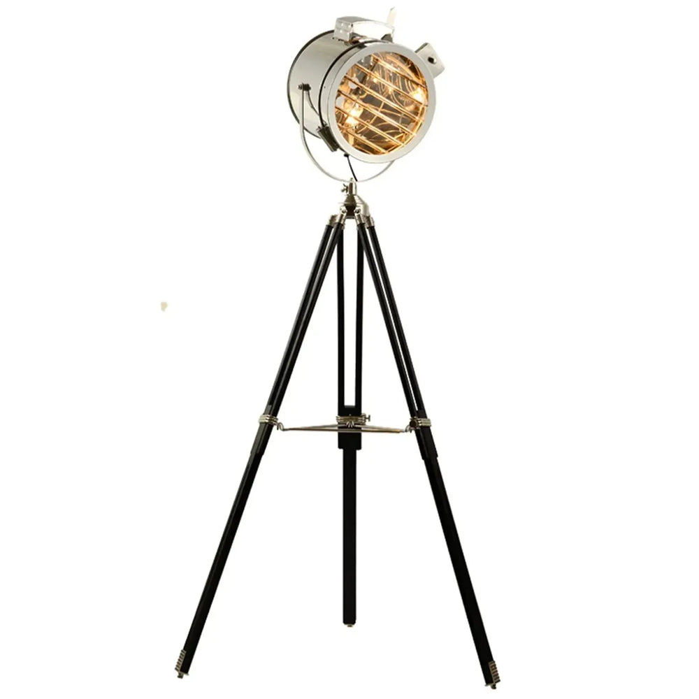 Industrial metal floor lamp tripod in white background.