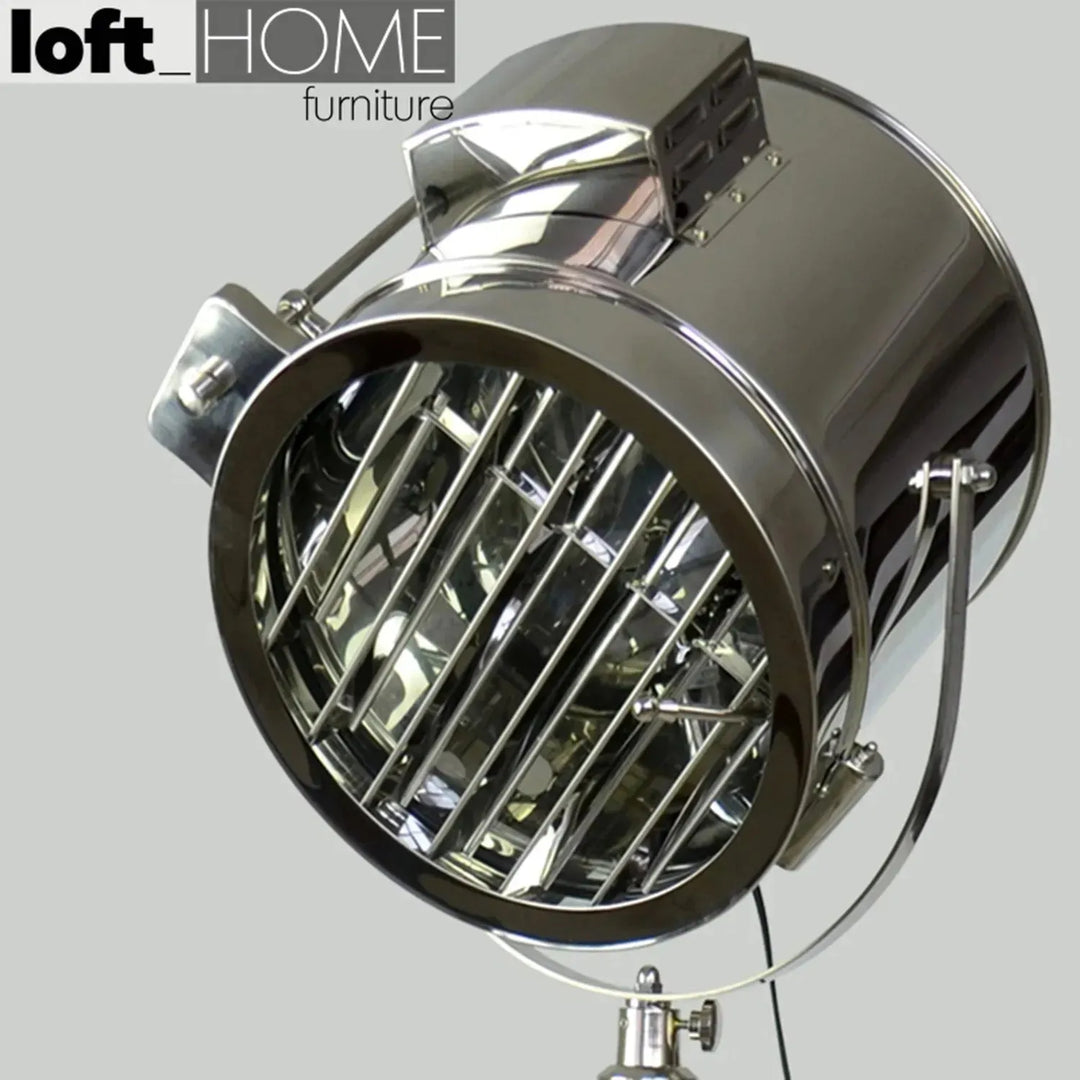 Industrial metal floor lamp tripod in real life style.
