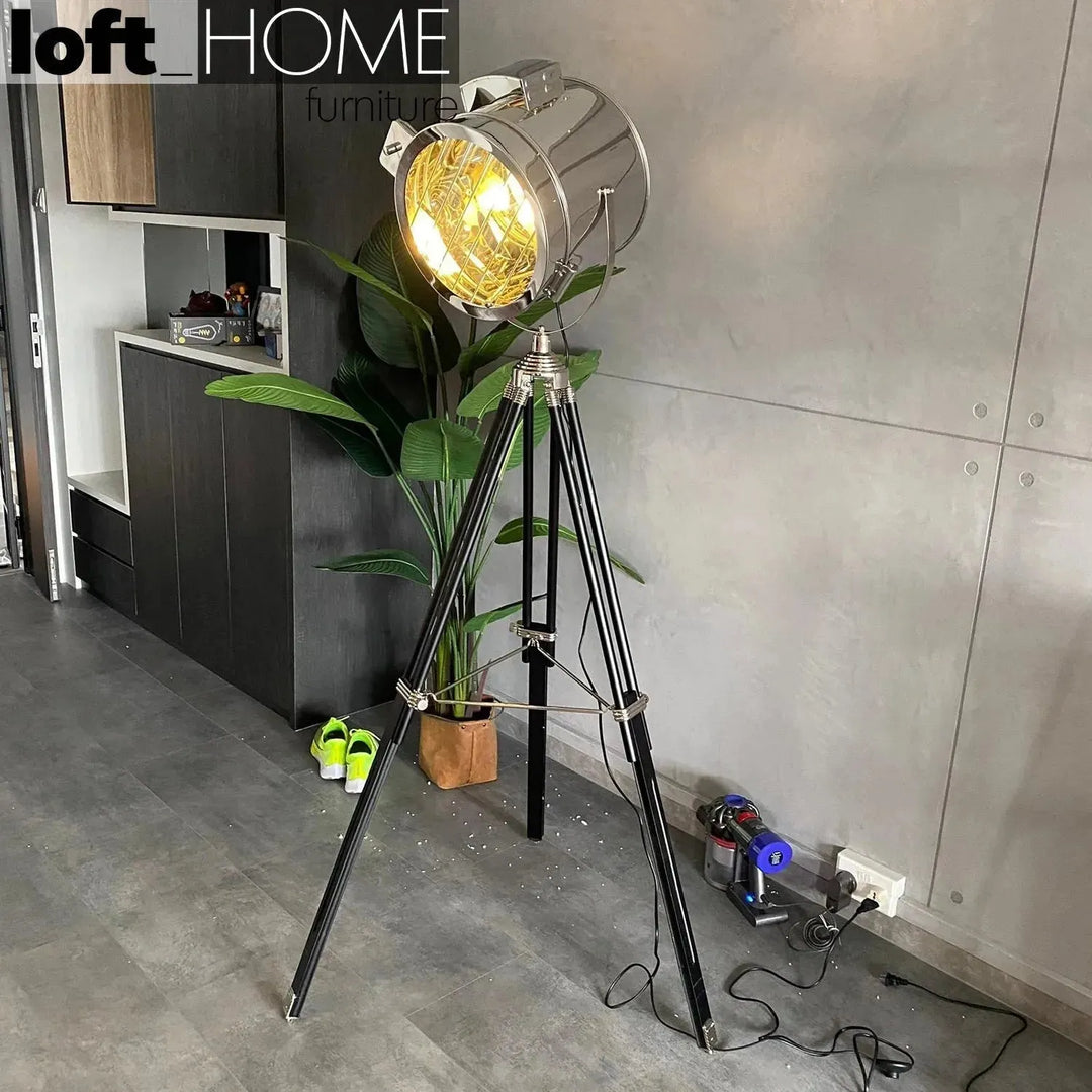 Industrial metal floor lamp tripod in panoramic view.
