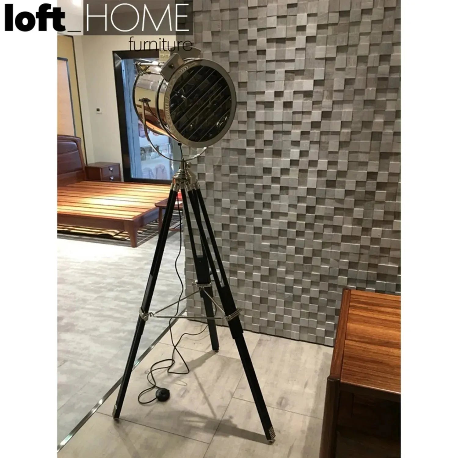 Industrial metal floor lamp tripod with context.