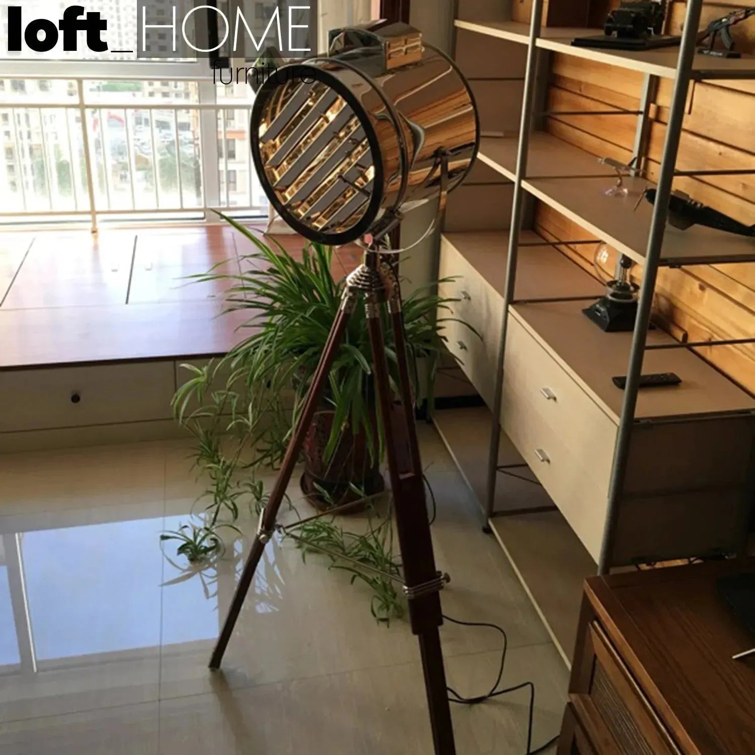 Industrial metal floor lamp tripod in close up details.