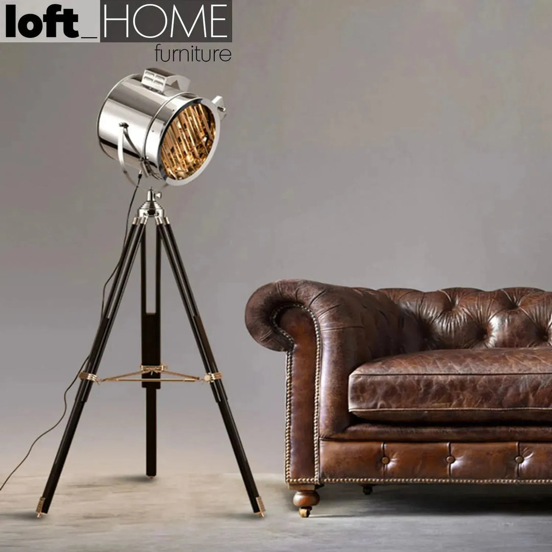 Industrial metal floor lamp tripod in details.