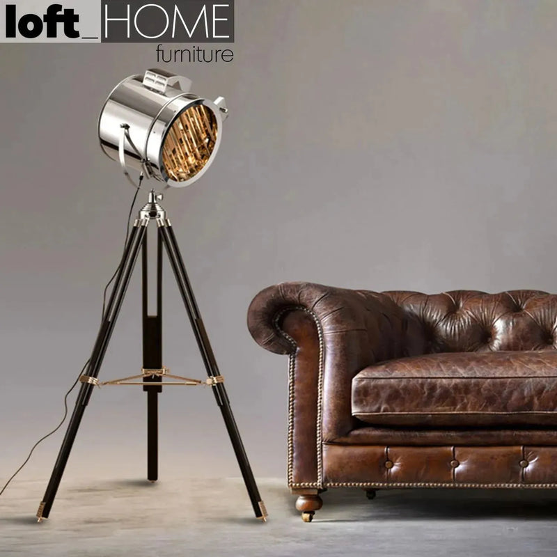 Industrial metal floor lamp tripod in details.