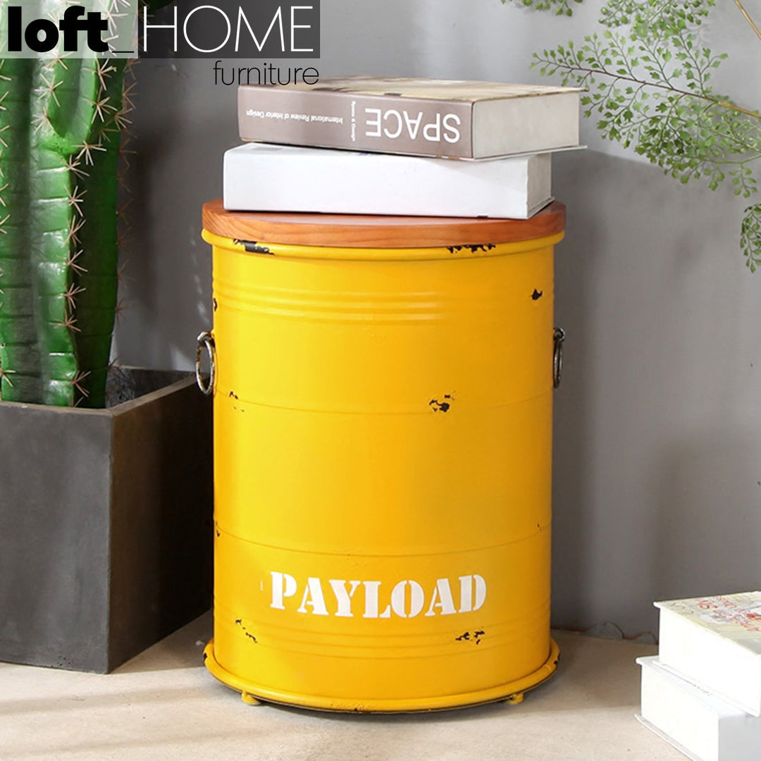 Industrial metal side table container round in real life style.