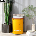 Industrial metal side table container round with context.