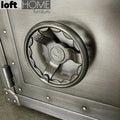 Industrial metal side table hatch wheel with context.