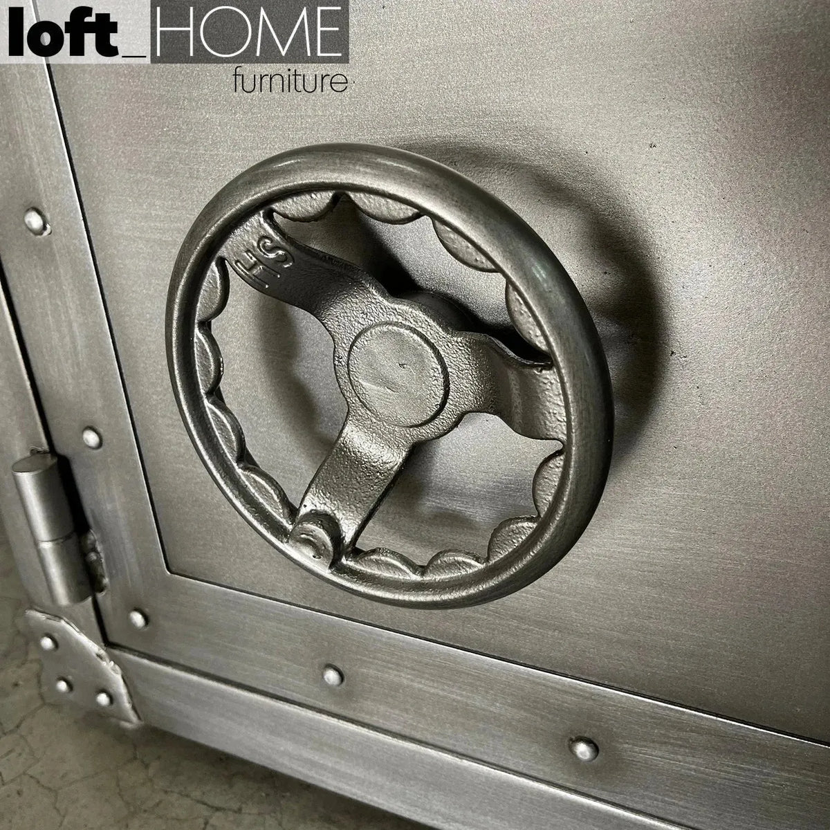 Industrial metal side table hatch wheel with context.