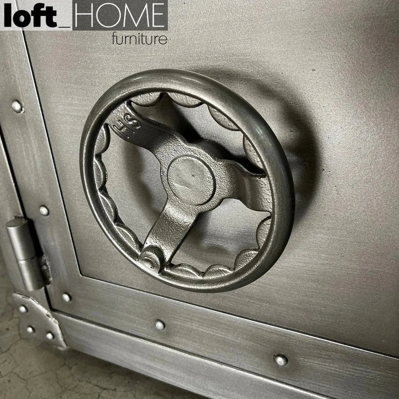 Industrial metal side table hatch wheel with context.
