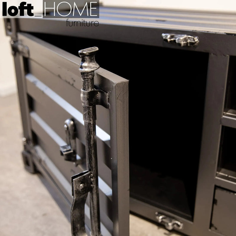 Industrial metal tv console container with context.