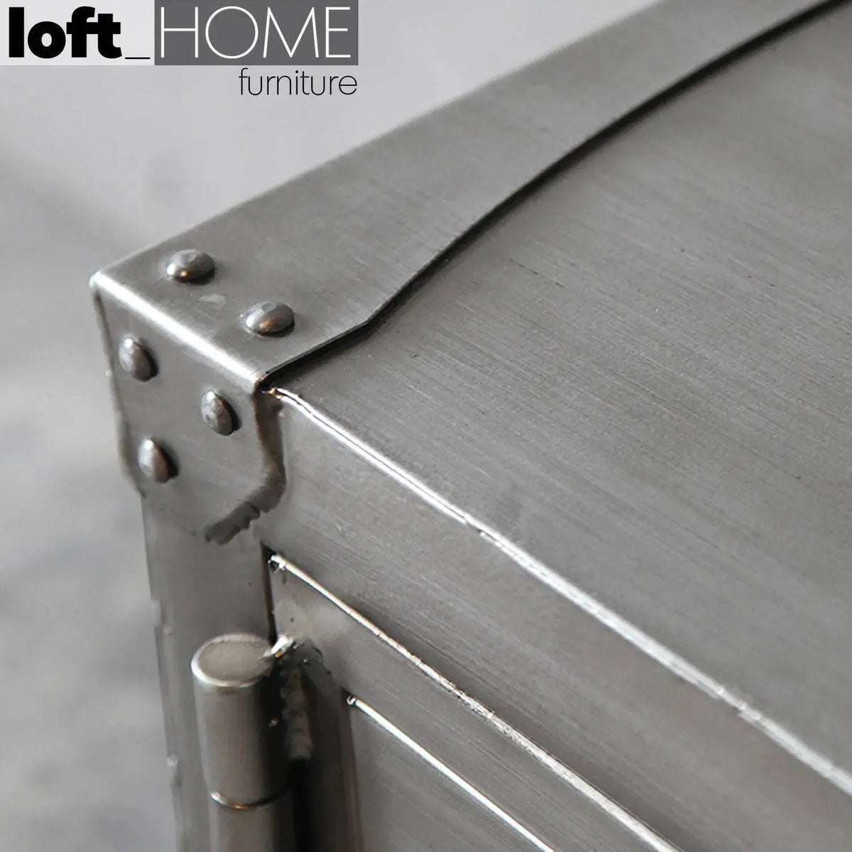 Industrial metal tv console hatch wheel in panoramic view.