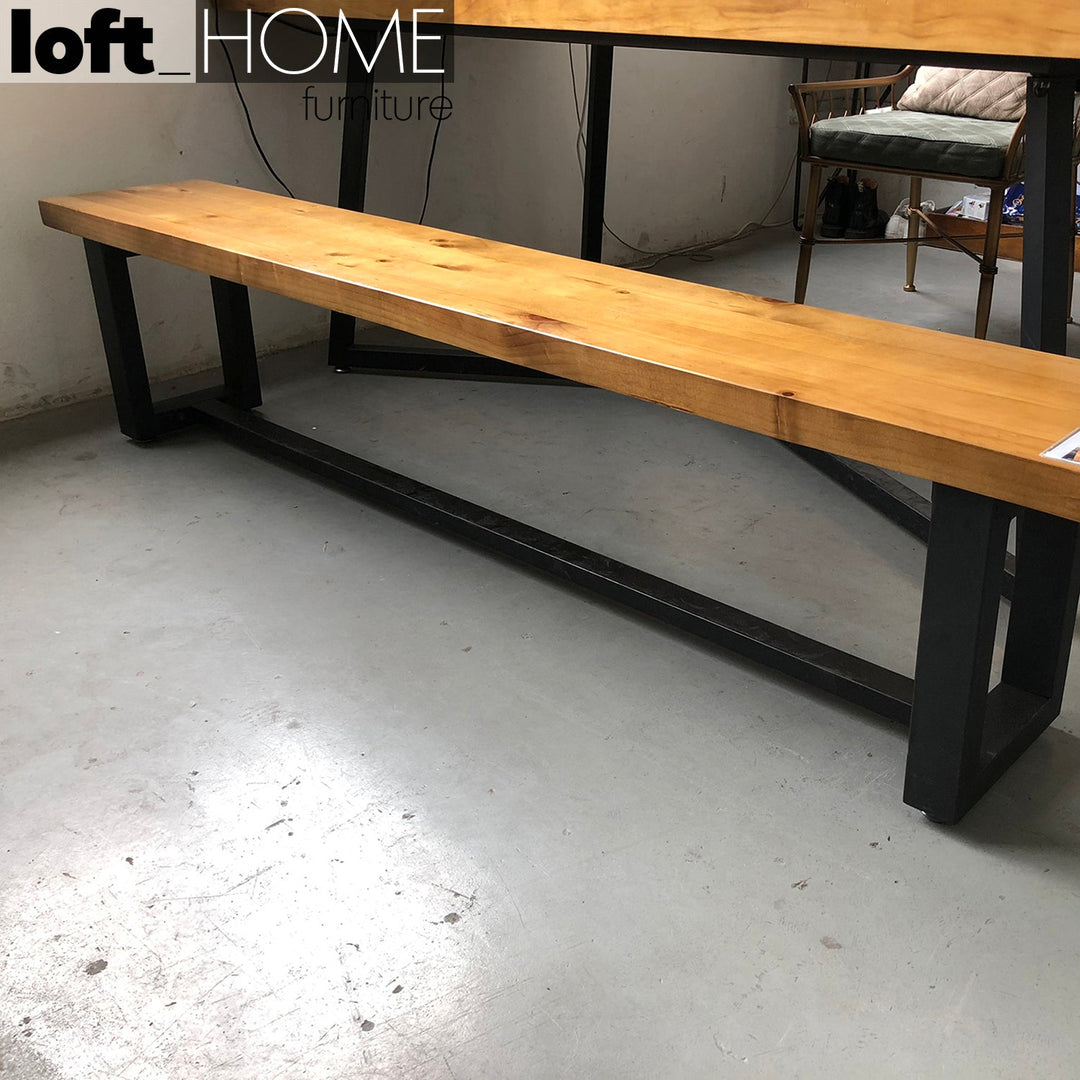 Industrial pine wood dining bench classic in panoramic view.