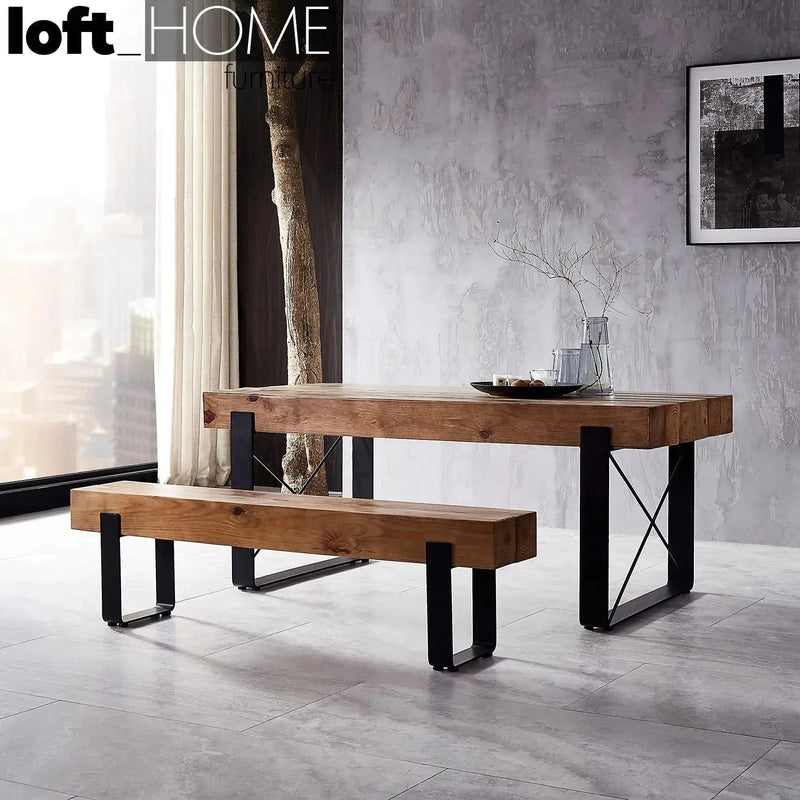 Rustic pine wood dining bench noer with context.