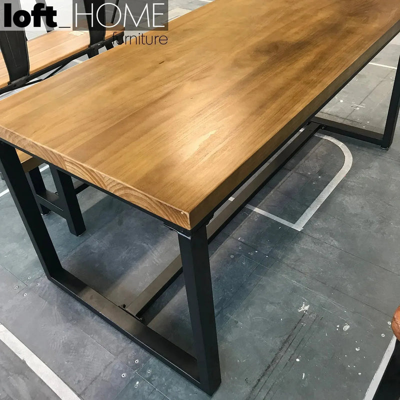 Industrial pine wood dining table classic in close up details.