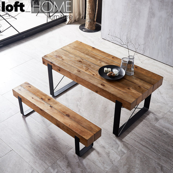 Industrial pine wood dining table noer with context.