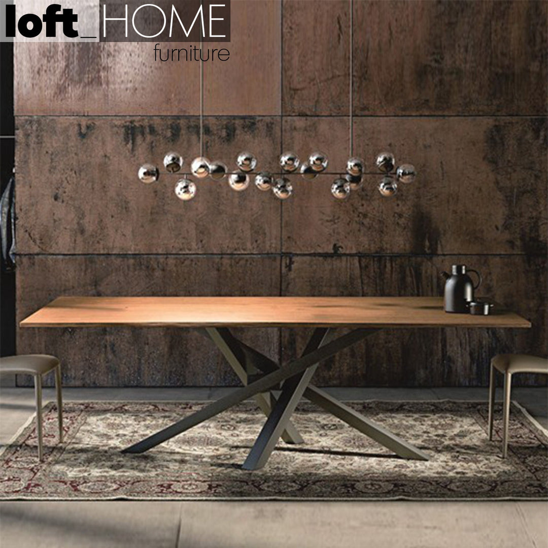 Industrial pine wood dining table twist with context.