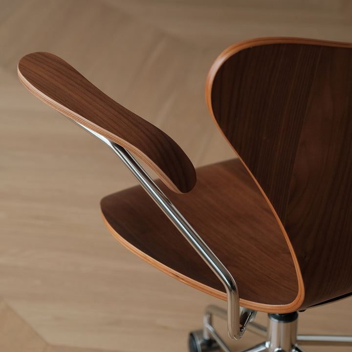 Industrial plywood study chair seven in still life.