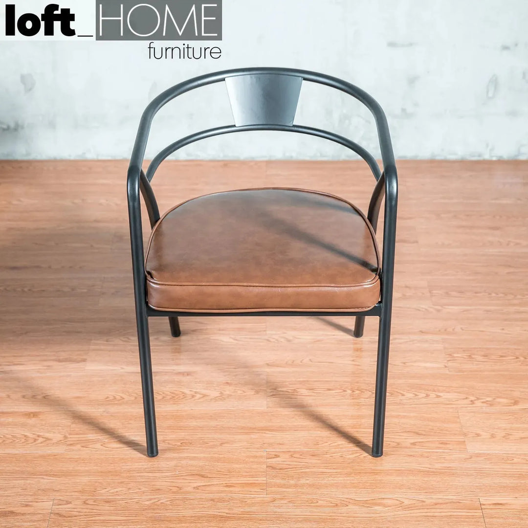 Industrial pu leather dining chair roundarm in panoramic view.